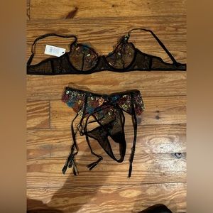 Women’s embroidery and Point de Sprit mesh bra with matching garter and g-string